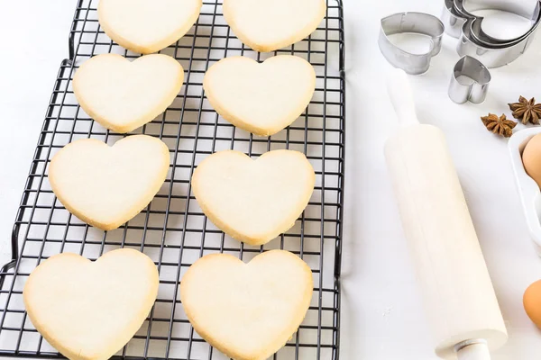 Baking heart shaped sugar cookies