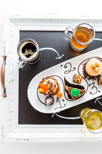 Tasting of wine and pattie chocolate pastries