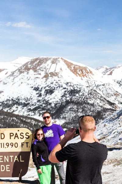 People take pictures at Loveland pass