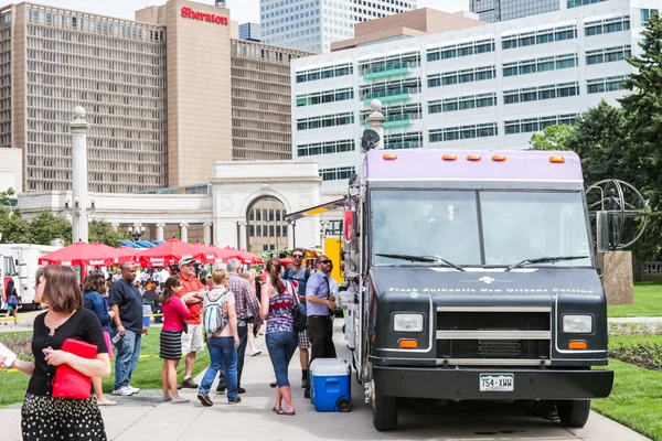 Gathering of gourmet food trucks at Civic Center Park