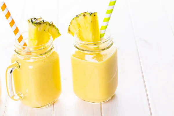 Homemade mango and pineapple smoothie