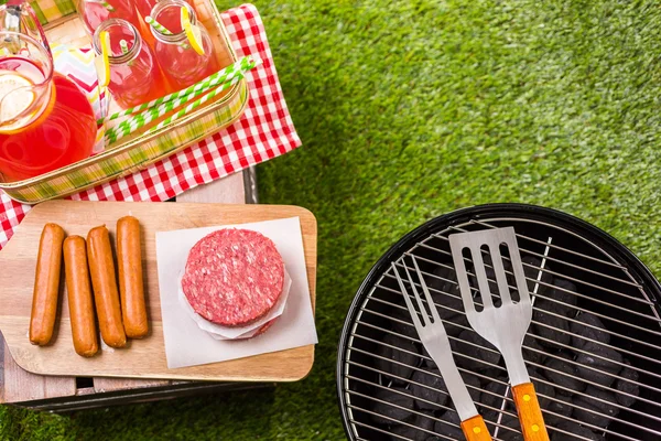 Summer picnic with small charcoal grill
