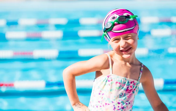 Kids swim meet in outdoor pool