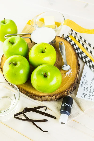 Preparing homemade black candy apples