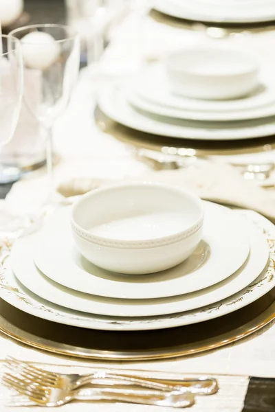 Table set with plates and silverware