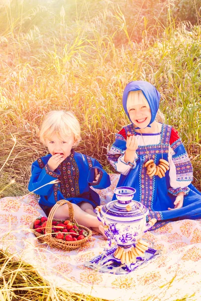 Kids wearing Russian costumes