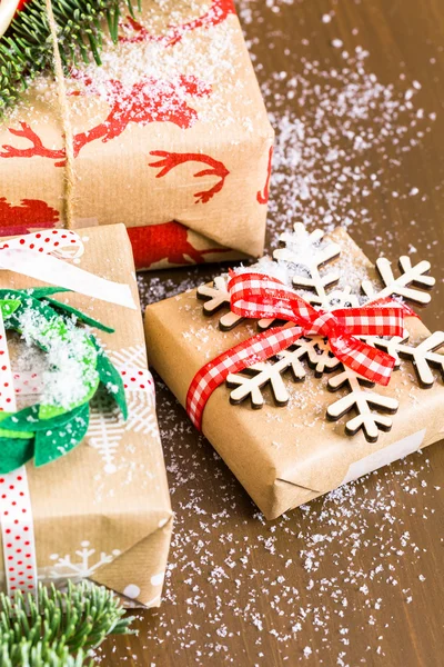 Christmas gifts wrapped in brown paper