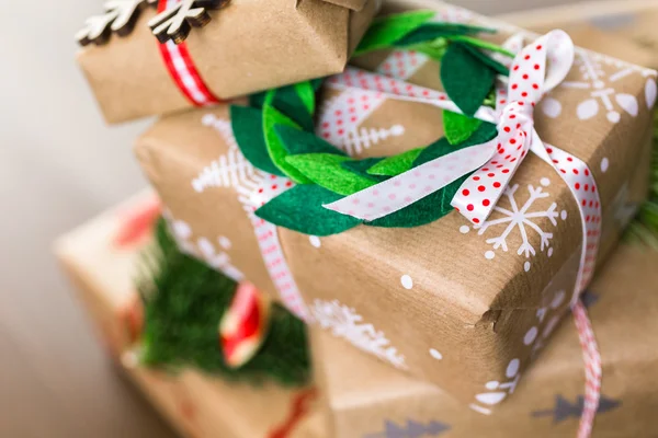 Christmas gifts wrapped in brown paper