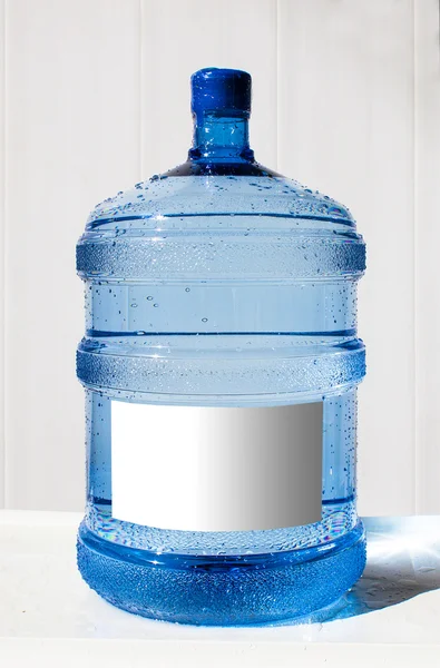 Big bottle of water on a white background