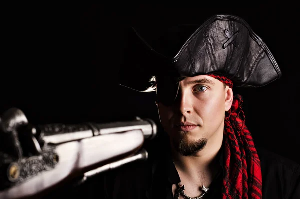 Frightened pirate at gunpoint