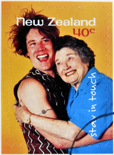 NEW ZEALAND- CIRCA 1998: A stamp printed in New Zealand shows Young and old woman, stay in touch, circa 1998