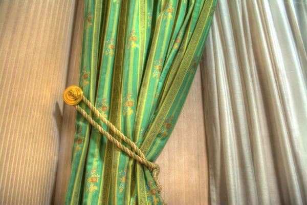 Close up of a green curtain in hdr