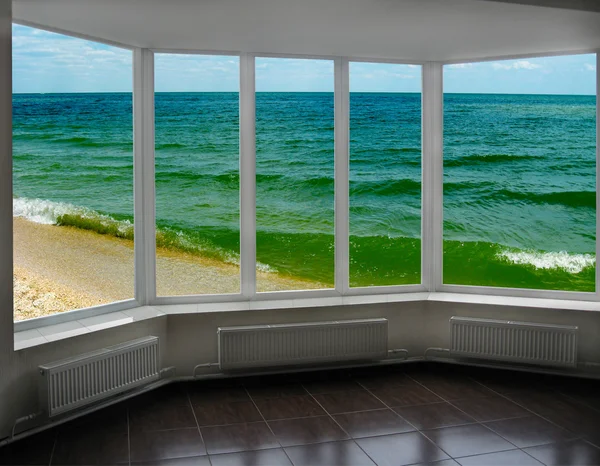 Plastic window with view of marine waves