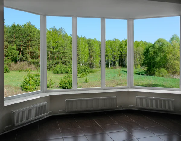 Plastic windows with view of forest