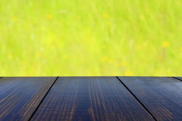 Table from wooden boards with natural background