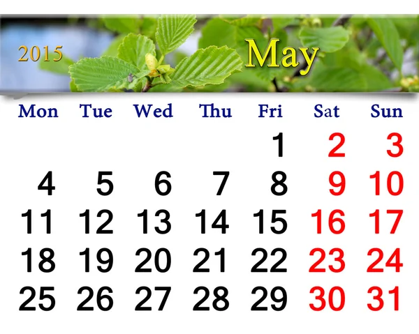 Calendar for May of 2015 year with alder leaves
