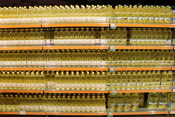 Bottles with sunflower-seed oil in the shop
