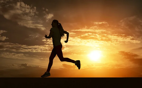 Beautiful silhouette of female running