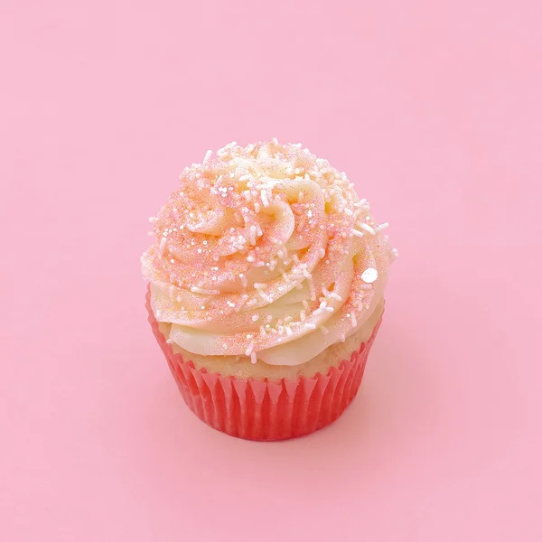 Cake on pink background. Vanilla minimalism