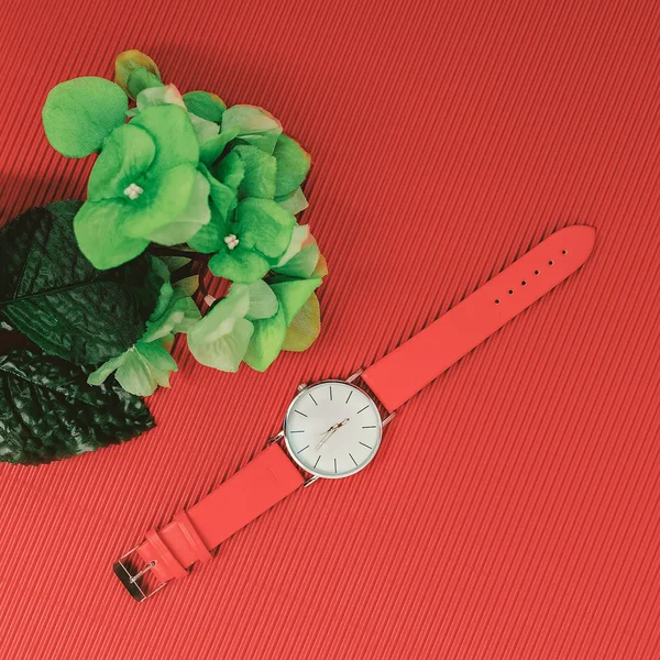 Stylish accessory. Red watch