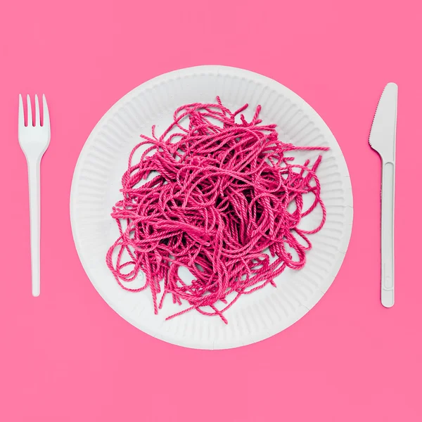 Fake Pink Pasta. Plastic life. Minimalism art.