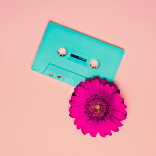 Cassette tape and flower. Minimalism Retro Style.