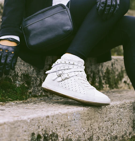 Lady on the streets. Trendy urban Loock. white sneakers.