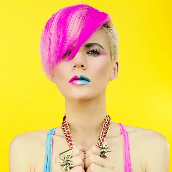 Hair color trend. Sensual stylish punk model
