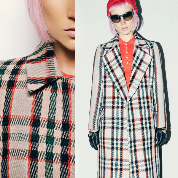Fashion model in red hat and checkered coat. Latest trend style