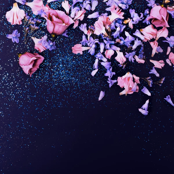 Mix flowers on shiny background. Minimalism fashion