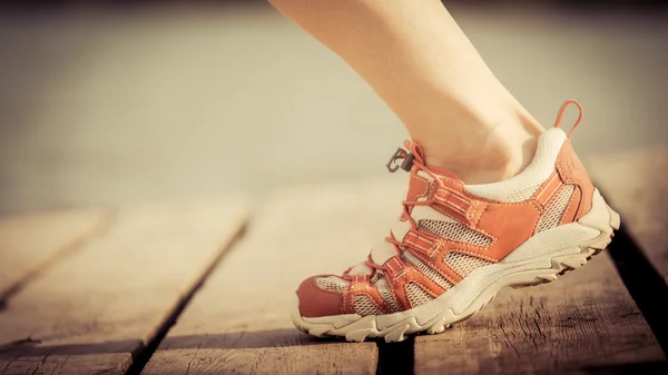 Feet of jogging woman