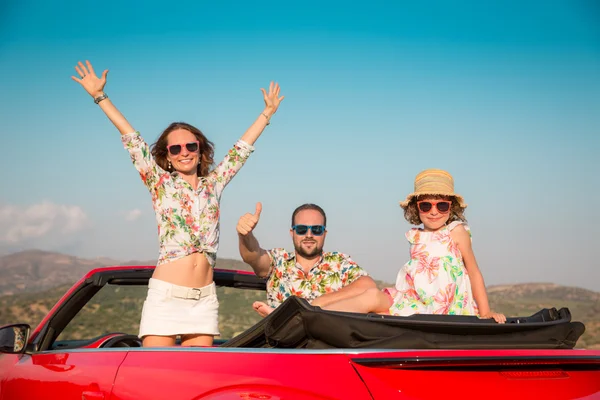 Happy family travel by car in the mountains