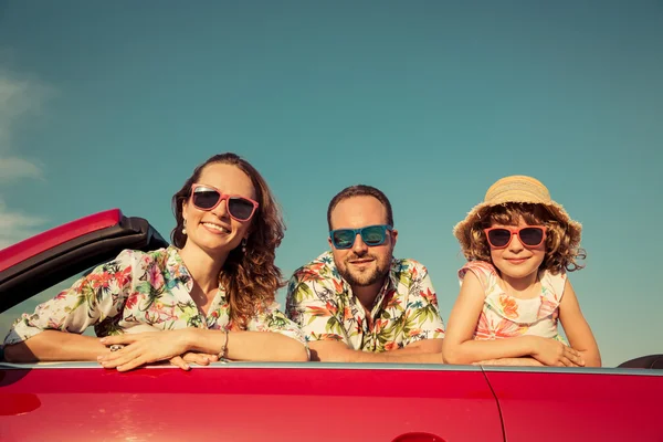 Happy family travel by car in the mountains