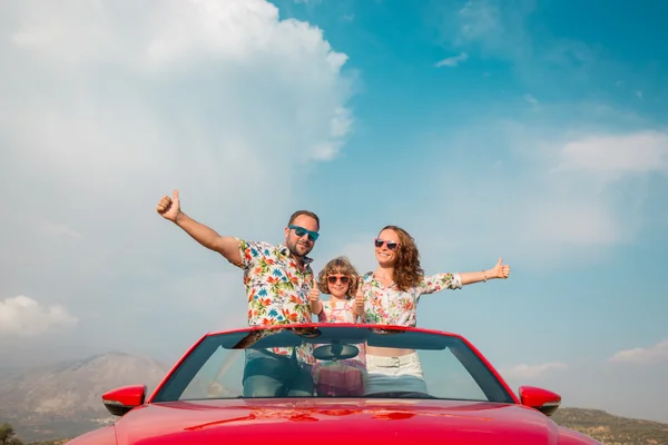 Happy family travel by car in the mountains