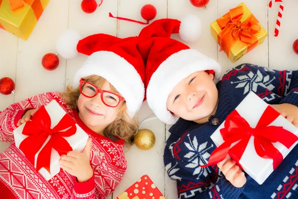 Portrait of happy children with Christmas decorations