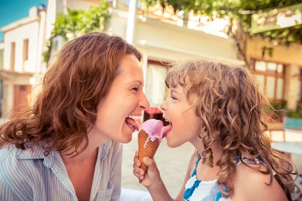 Mother and child eating ice-cream