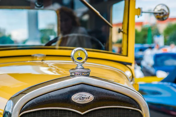 Closeup frontal view of a vintage Ford car