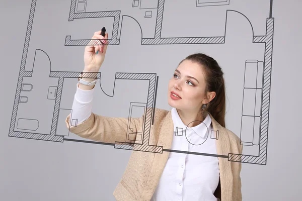 Female architect working with a virtual apartment plan