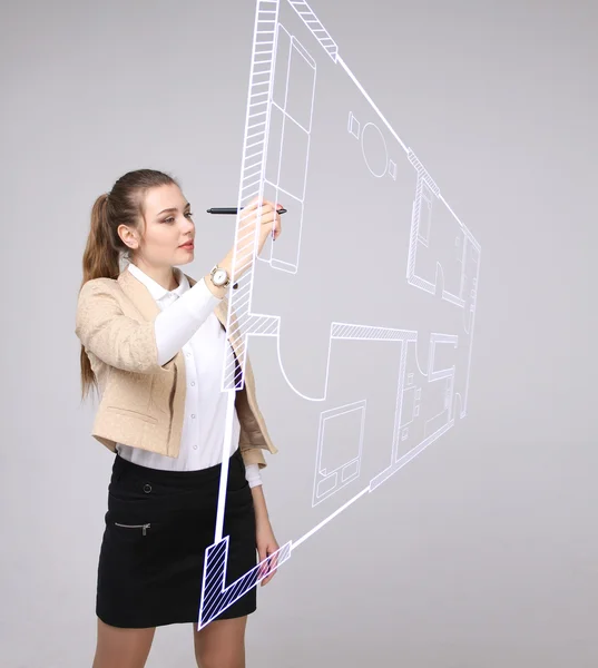 Female architect working with a virtual apartment plan