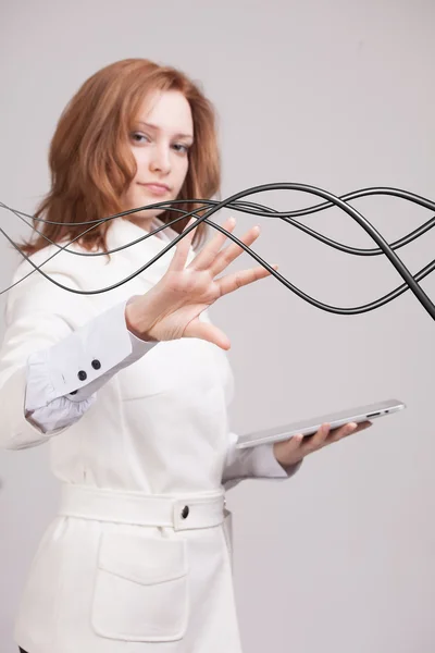 Woman with electrical cables or wires, curved lines