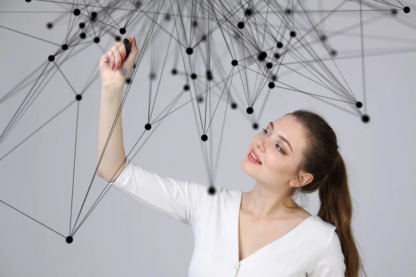 Worldwide network or wireless internet connection futuristic concept. Woman working with linked dots.