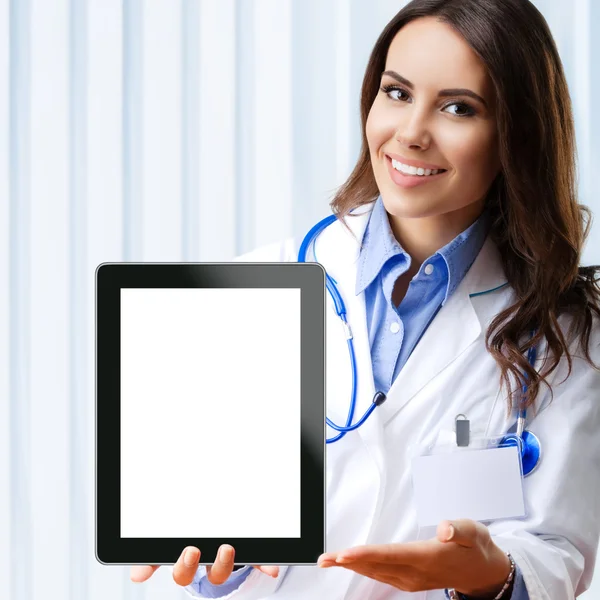 Doctor with blank tablet pc for copyspace