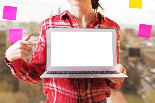 Woman with blank laptop