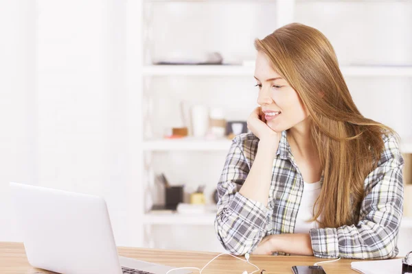 Businesswoman looking at screen