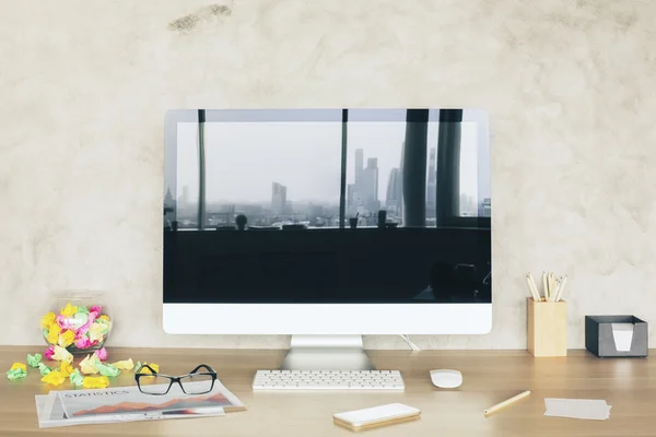 Monitor with city reflection