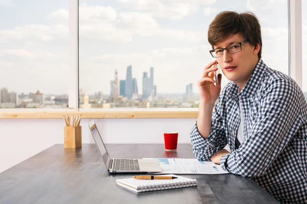 Attractive man having phone conversation