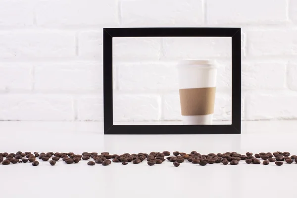 Coffee cup inside frame