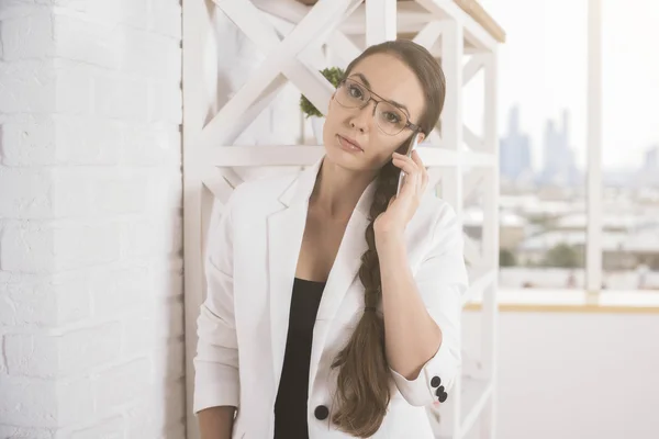 Beautiful business lady on phone