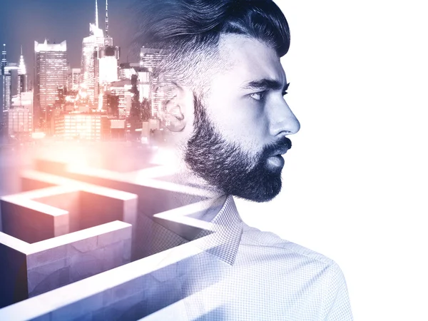 Side view of young man on side turned city and maze background with abstract sunlight. Business obstacle concept. Double exposure