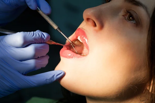 Young girl having dental check up